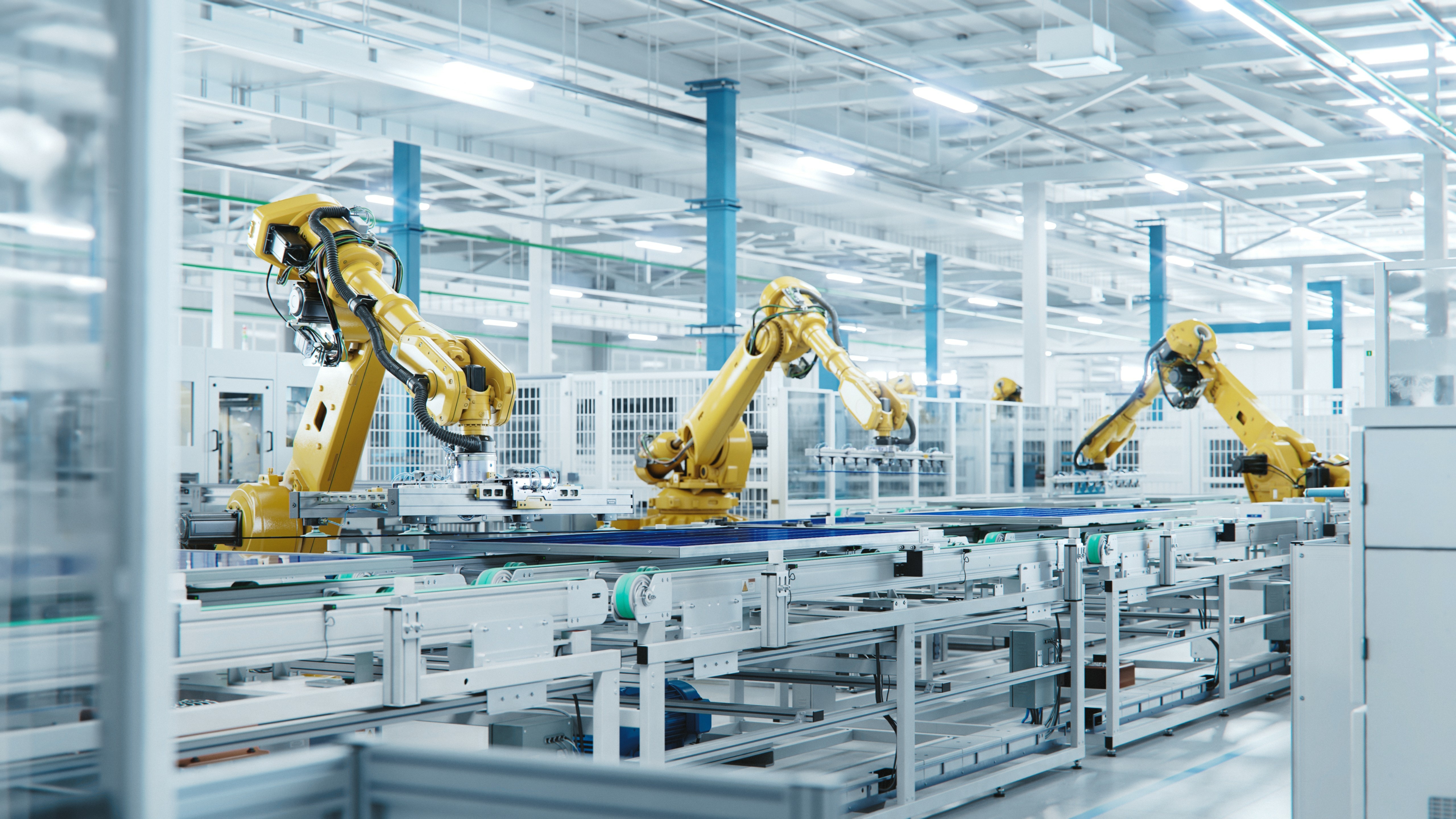 Yellow industrial automation machines in a factory